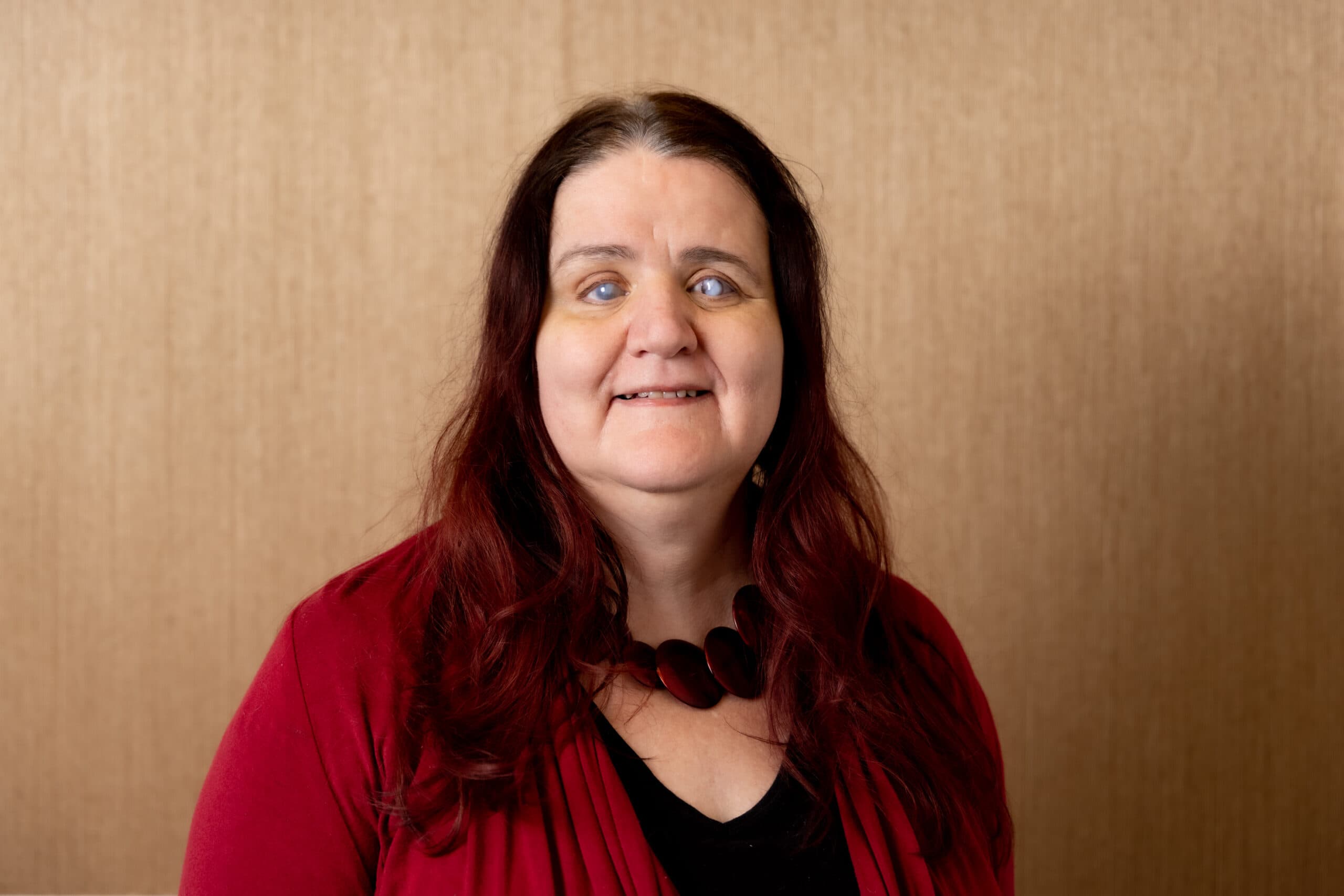 RNZFB Board Director, Martine Abel-Williamson smiles at the camera