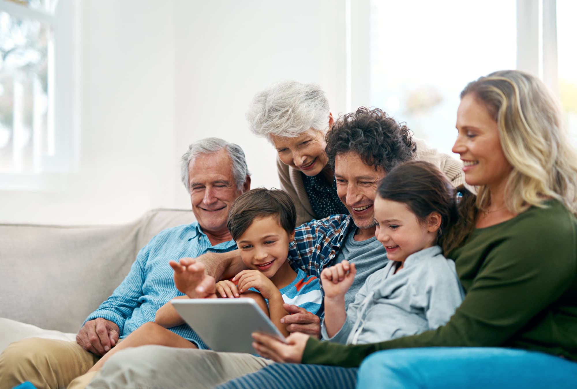 Family looking at iPad