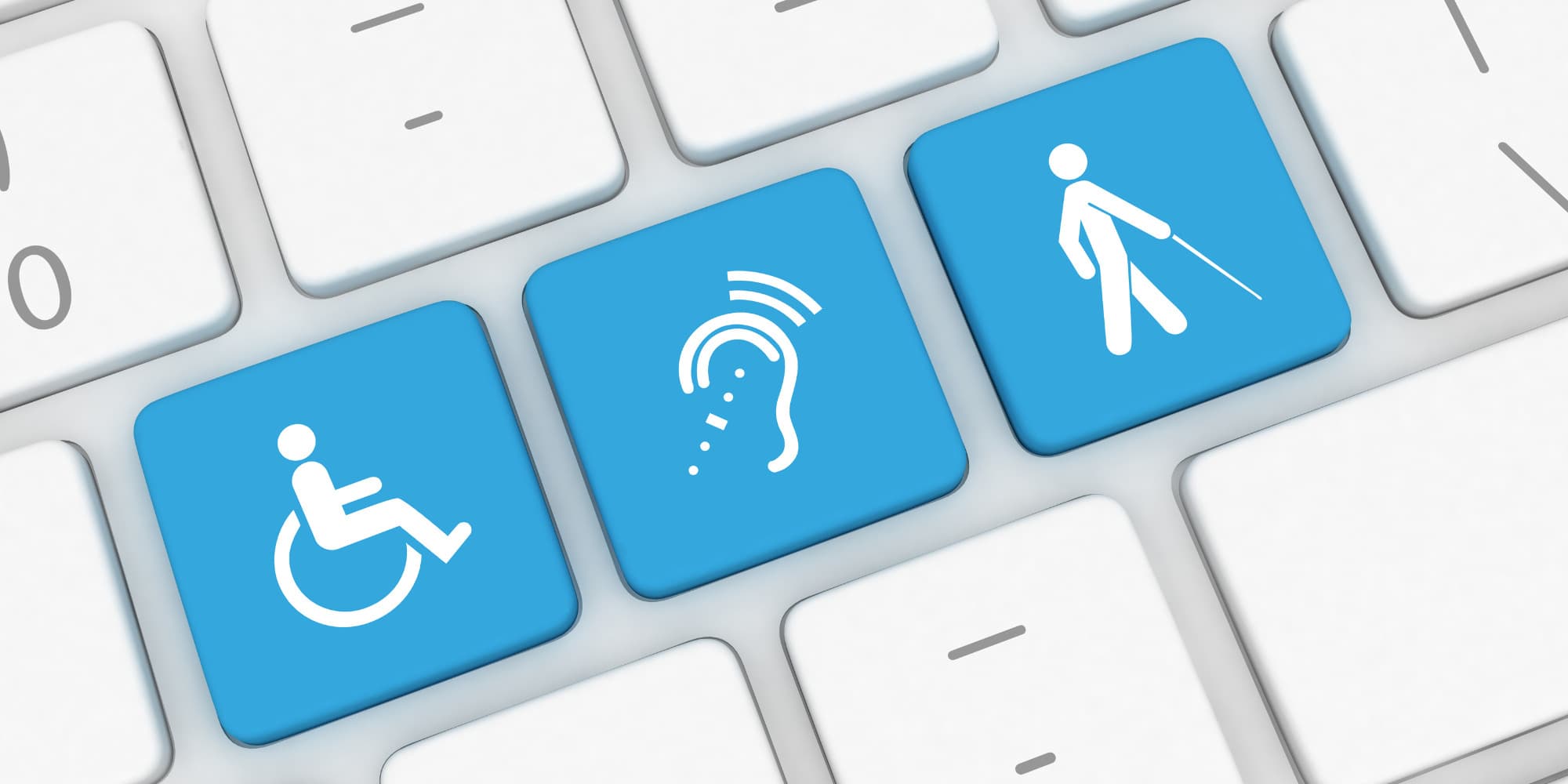 A close up of a keyboard featuring 3 particular keys depicting Blind Deaf and Disabled logos.