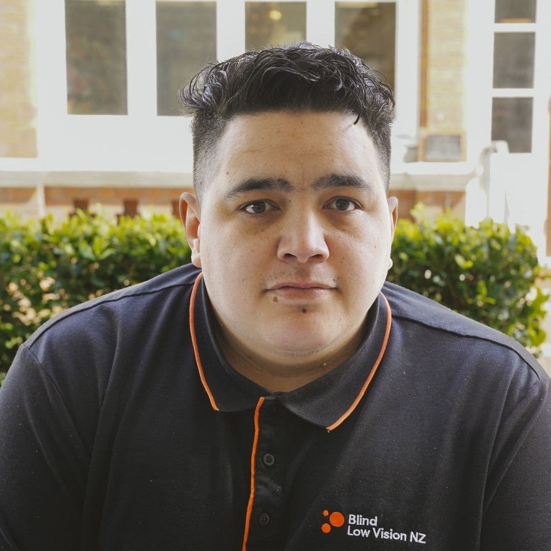 A close up of a man looking at the camera.