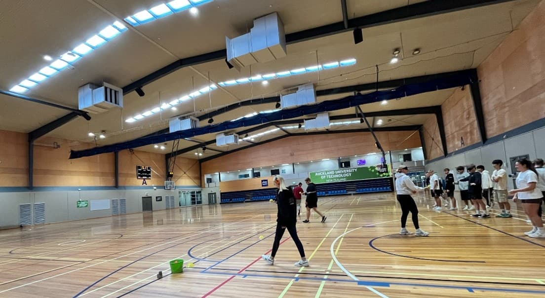 A group of people in a gym.