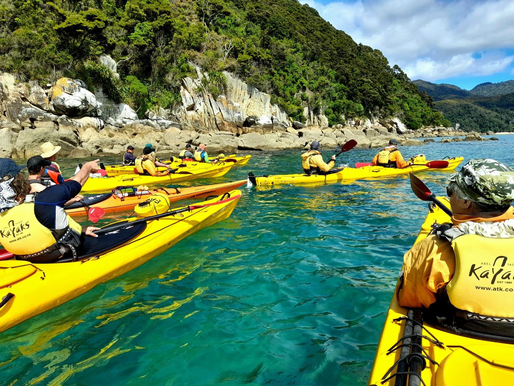 A group of clients on a kayaking adventure