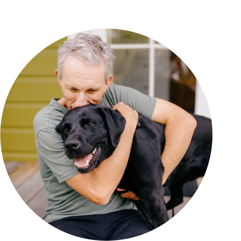 Client with black guide dog